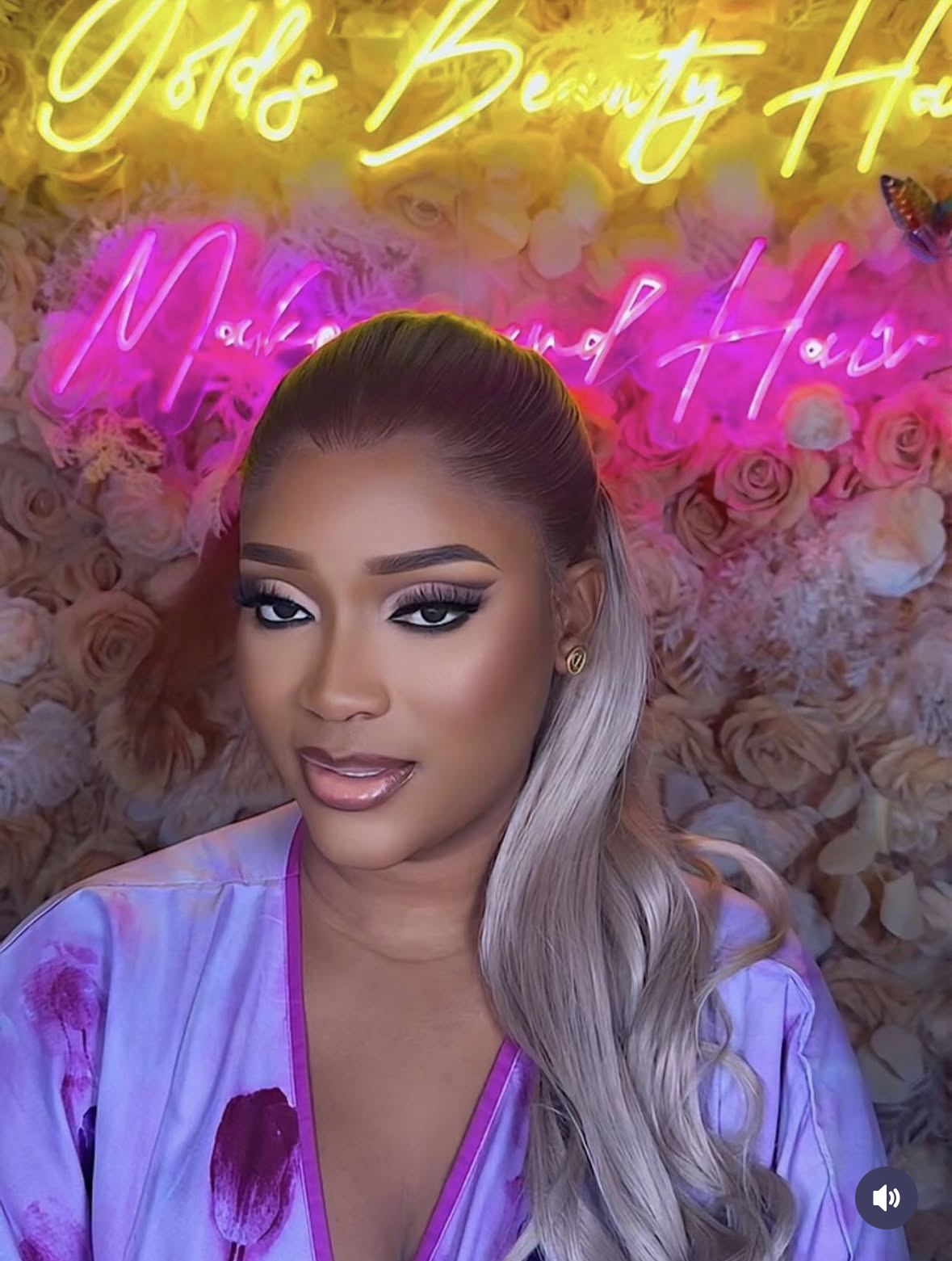 Glam makeup with sleek silver ponytail wig